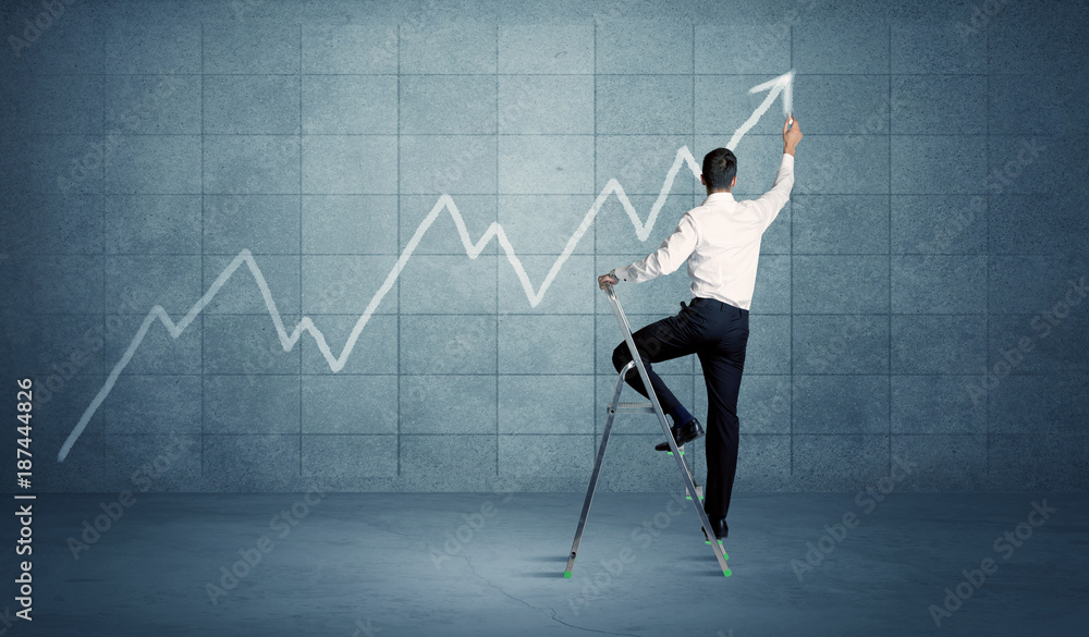 Obraz premium Man drawing line from ladder