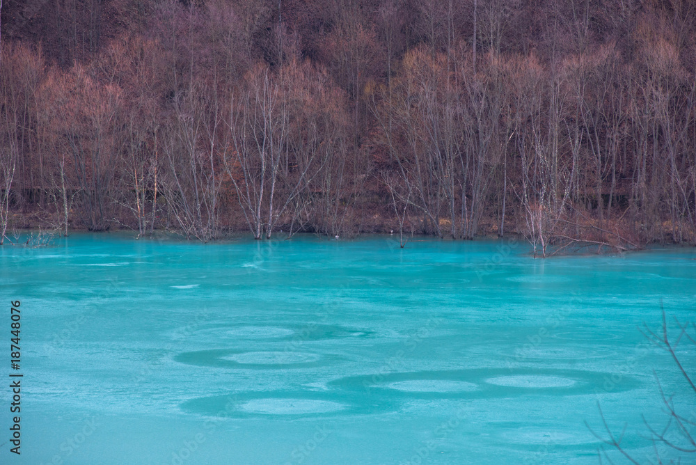 Turquoise waste lake contaminated with mining residuals in Geamana