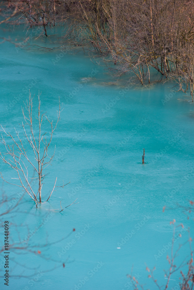 Turquoise waste lake contaminated with mining residuals in Geamana Turquoise waste lake contaminated with mining residuals in Geamana