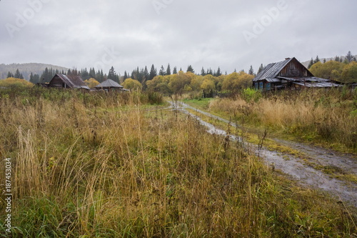 Rural landscape with an abandoned old village, late autumn.
Very ancient, forgotten village in the Siberian taiga.