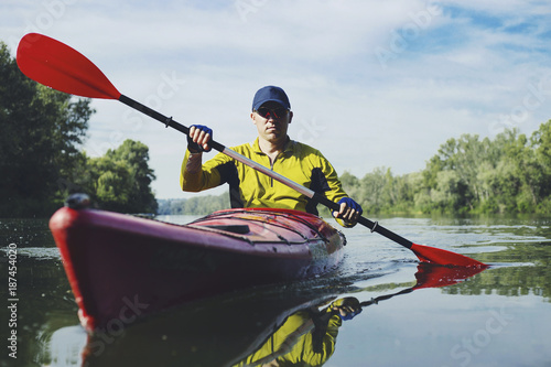 Kayak Water Sports Banner with Copy Space. Senior Kayaker on the Scenic Lake Panoramic Photo.