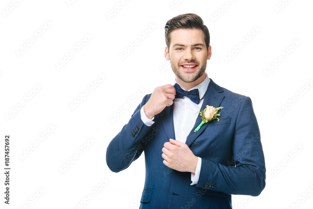 portrait of young handsome groom in suit isolated on white portrait of young handsome groom in suit isolated on white