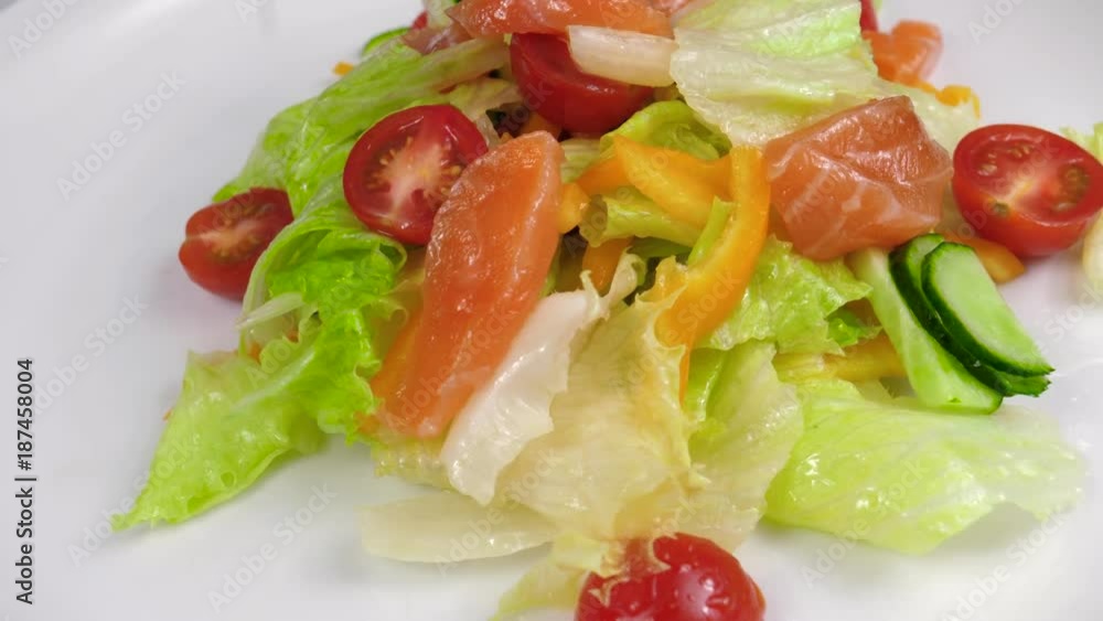 Process of preparing a salad with vegetables, adding lemon juice Process of preparing a salad with vegetables, adding lemon juice