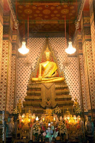 Golden sitting Main Buddha at main Prang of Wat Arun Ratchawararam temple ,Bangkok,Thailand. © topten22photo