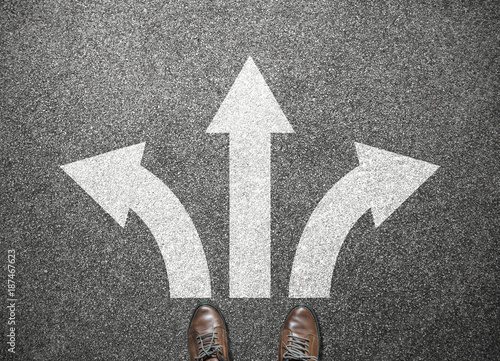 businessman shoes stand at junction, choose way to success
