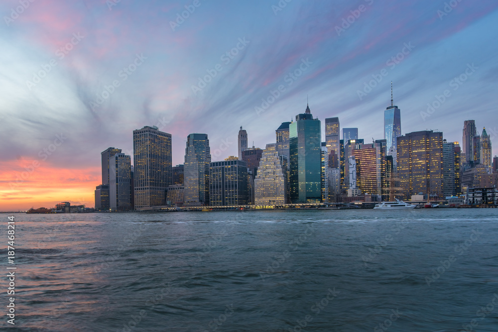 Manhattan's Financial district skyline at night from the Brooklyn Bridge Park, New York City