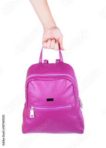 Pink woman handbag isolated on white background. pink backpack in hand