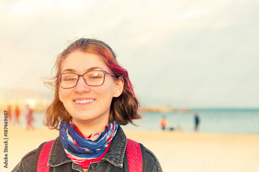 Portrait of young girl on an autumn beach Portrait of young girl on an autumn beach