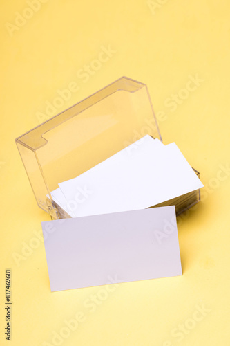 Name cards in white color in card holder, copy space.
