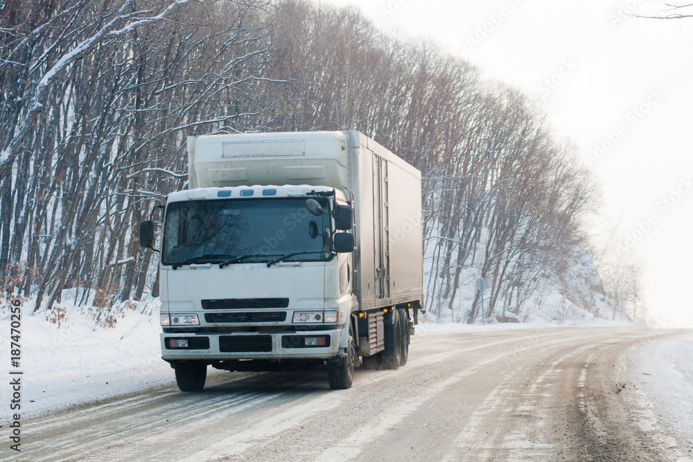 Truck on a winter road Truck on a winter road