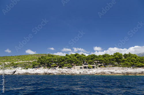 A wide angle view of destroyed houses from the war near Dubrovnik, Croatia. © Danaan