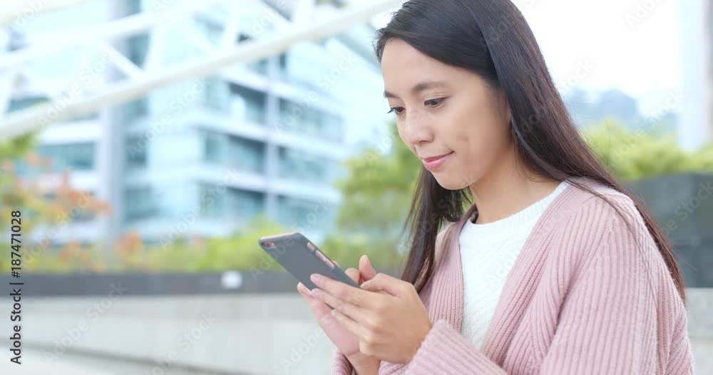Woman use of smart phone at outdoor Woman use of smart phone at outdoor