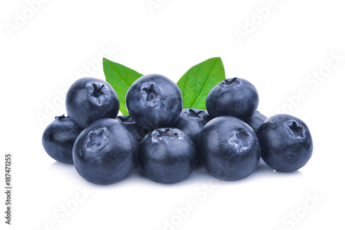 blueberries with green leaves isolated on white background