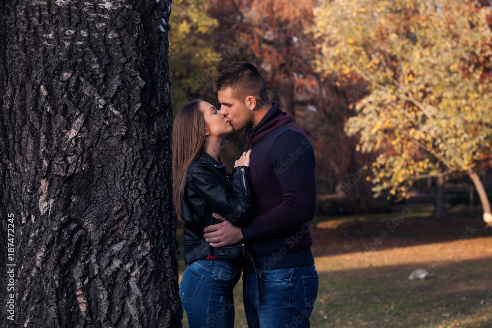 Happy young couple in autumn park Happy young couple in autumn park
