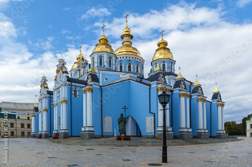 St. Michael's Monastery, blue walls, golden domes, white columns against the sky. michael s monastery kiev photo