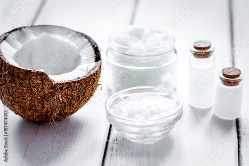 organic cosmetics with coconut on white background