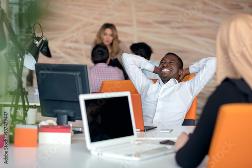 Black Male Designer Working At Desk In Modern Office