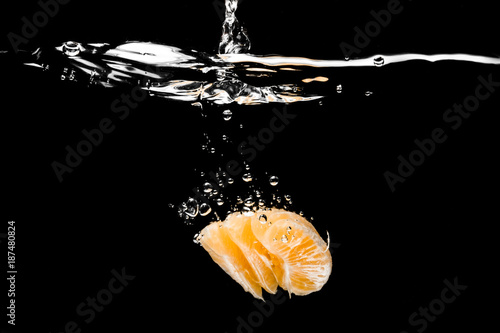 fruits falling in to a water