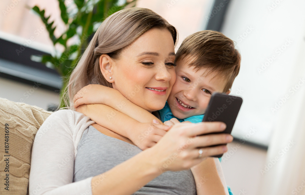 happy family with smartphone at home happy family with smartphone at home