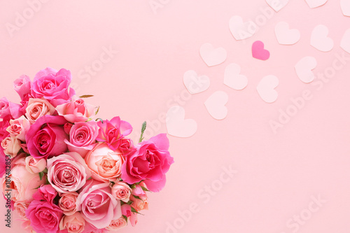 Valentines background with heart shaped bouquet and paper hearts © nana77777