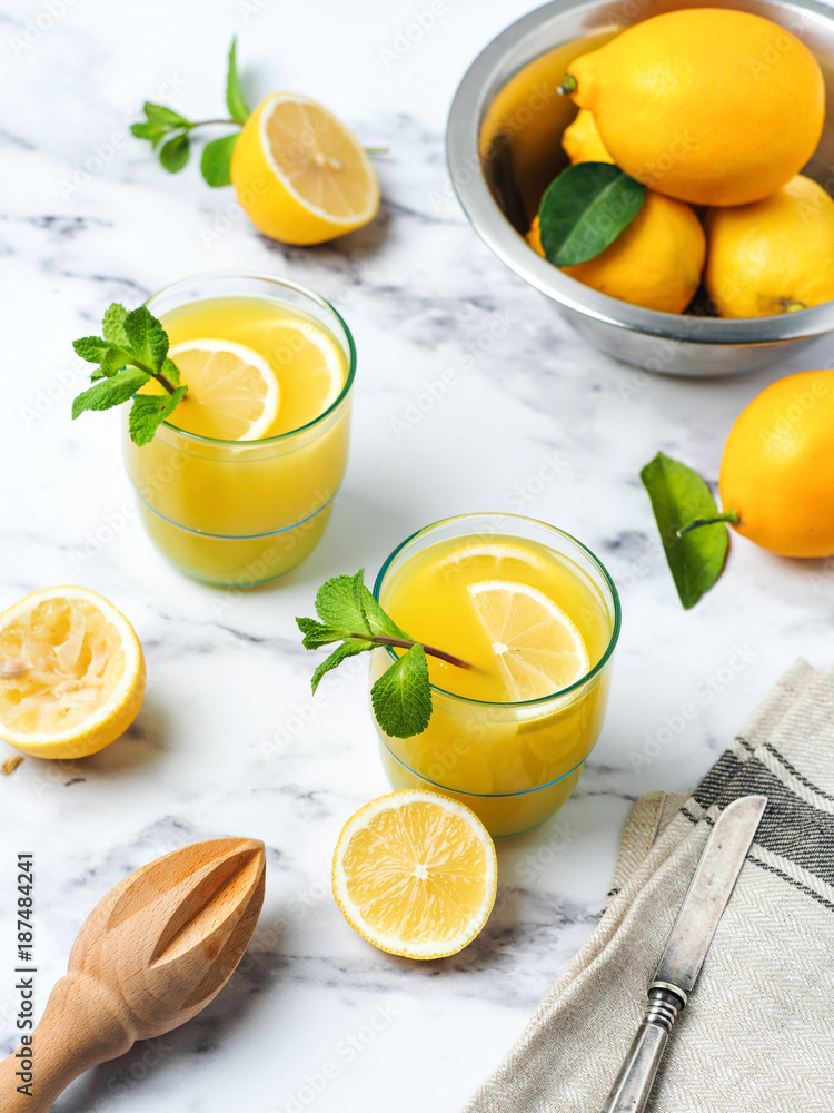 Two glasses of lemon juice Two glasses of lemon juice