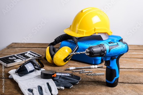Drill and set of drill,tools,carpenter and safety, Protection Equipment © sirastock