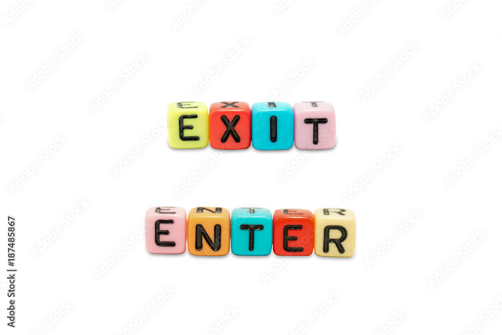 Close up image of the alphabet dices which are arranged for the word EXIT and ENTER, isolated on white background and embedded clipping path. Close up image of the alphabet dices which are arranged for the word EXIT and ENTER, isolated on white background and embedded clipping path.