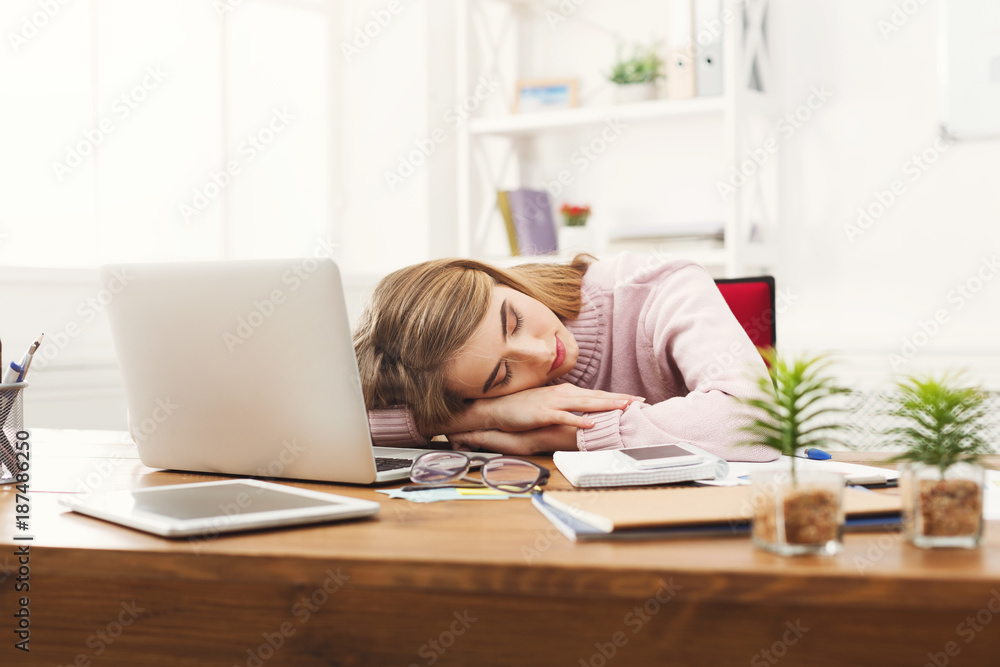 Sleeping overworking business woman at office Sleeping overworking business woman at office
