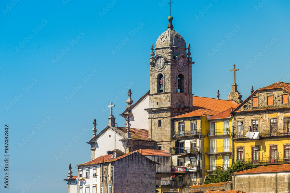 Porto skyline with the Clerigos church tower. View from a terrace in the Flores street, Porto, Portugal