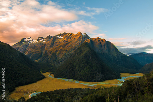 Southern Alps mystic light over the mountains, sunset on Routeburn Track Great Walk Mt Aspiring National Park