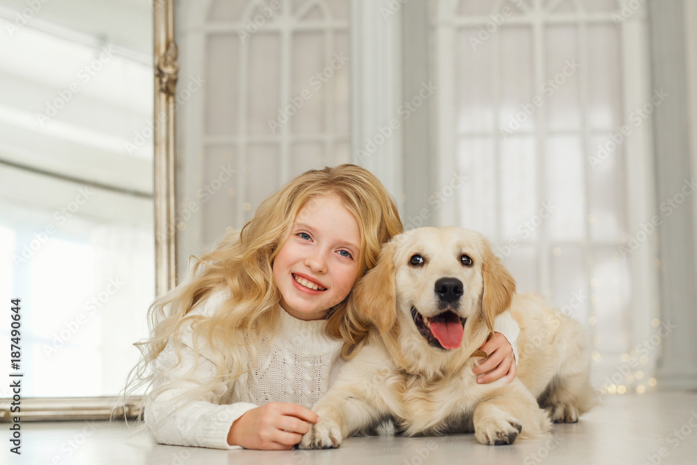 Little girl with golden retriever Little girl with golden retriever