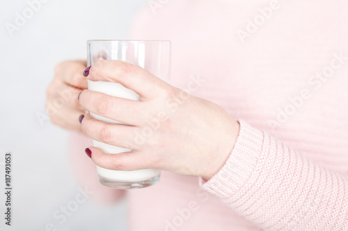 woman ready to drink a mug of milk
