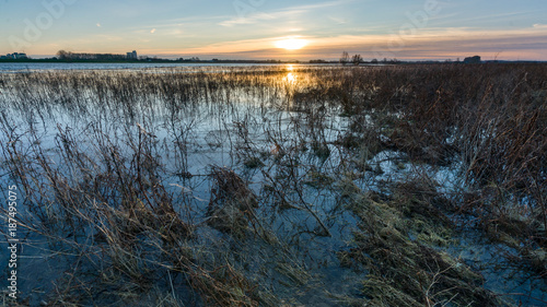 Landscape of flood plain And Sky with sunset on background