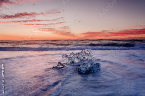 Ice crystal on coast in evening