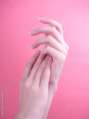 Close up of beautiful Woman Hands. Spa and Manicure concept. Female hands with french manicure. Soft skin, skincare concept. Beauty nails.
