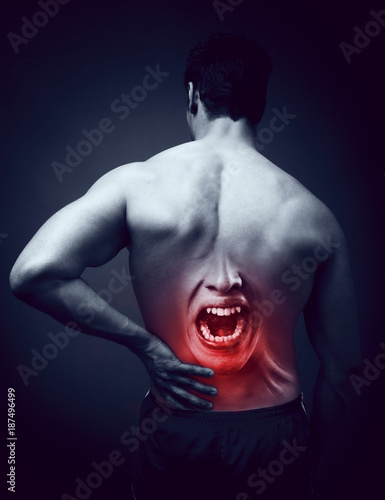 Man suffering back pain