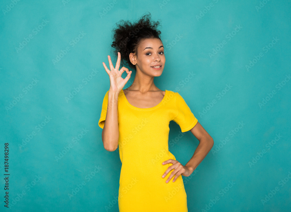 Young beautiful woman showing ok sign Young beautiful woman showing ok sign