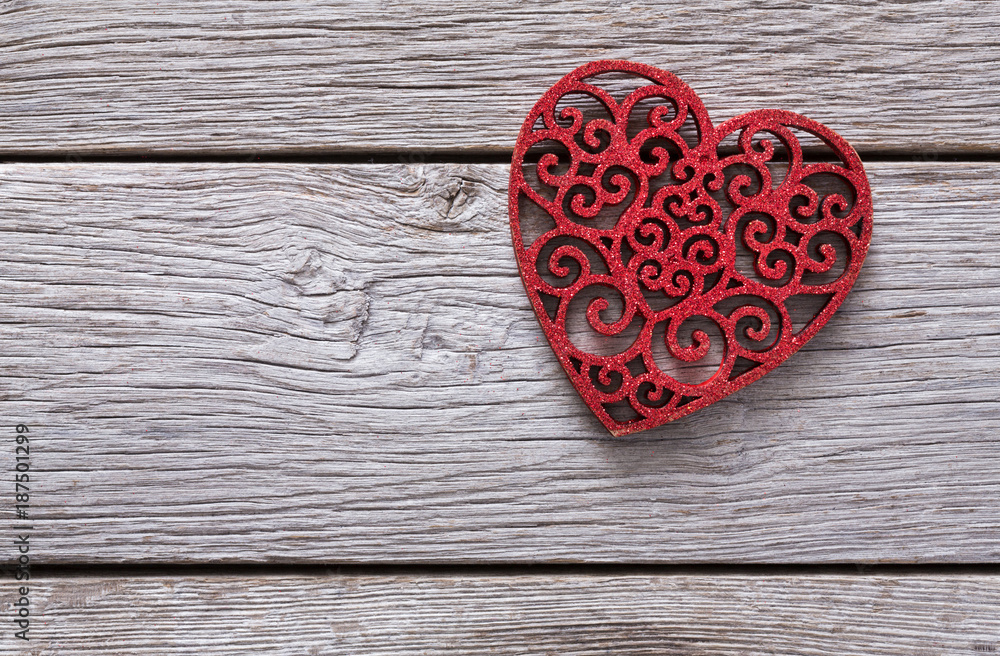 Valentine background with lace red heart shape on rustic wood Valentine background with lace red heart shape on rustic wood