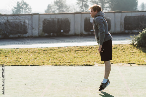 Young athlete doing burpee in Austria © Nena