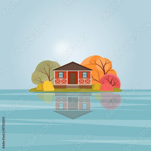 Nature landscape with a red wooden house on the lake