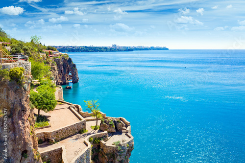 Terrace on cliff near blue Gulf of Antalya in popular seaside resort city Antalya, Turkey photo