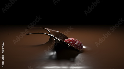 raspberries falling into melt chocolate