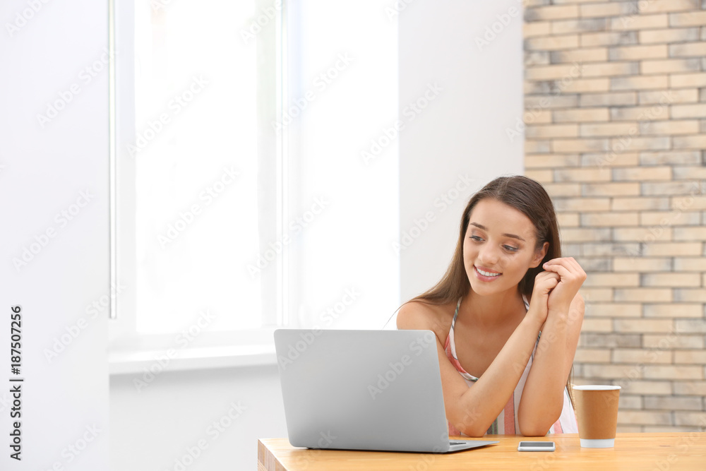 Pretty woman with modern laptop at home Pretty woman with modern laptop at home