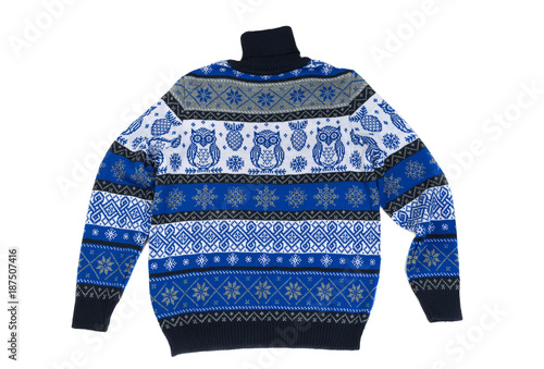 Blue Children's knitted sweater with a pattern. Isolate on white