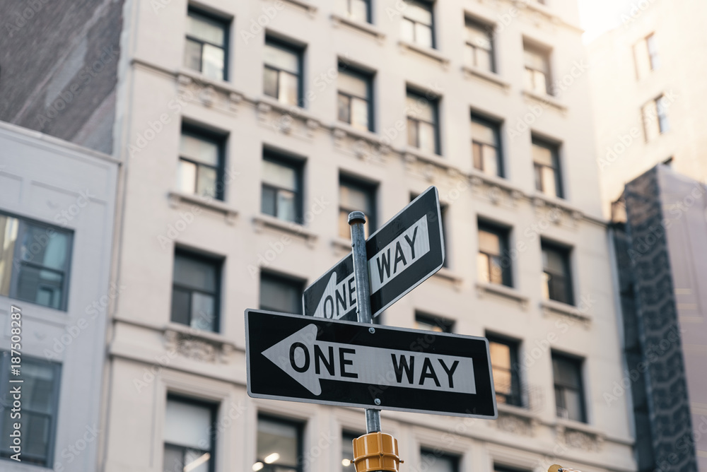 One way arrow sign in New York City. One way arrow sign in New York City.