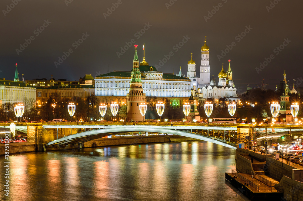 Illuminated Moscow Kremlin and Moscow river in winter evening., Russia