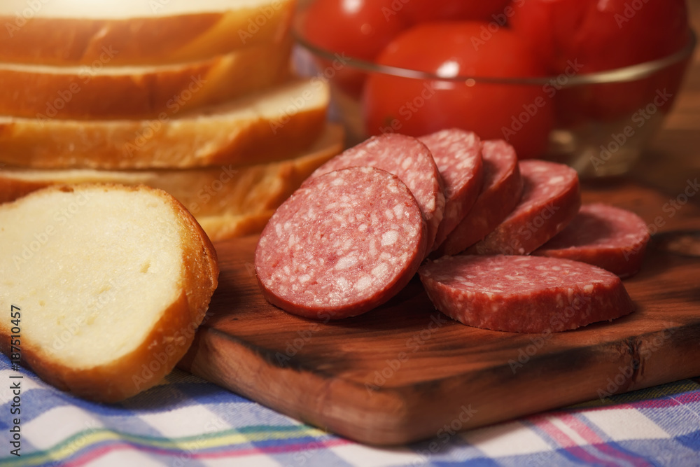 Beef sliced smoked sausage with canned tomatoes and bread Beef sliced smoked sausage with canned tomatoes and bread
