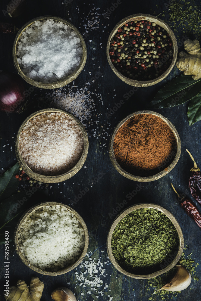Set of spices on rustic blue background Set of spices on rustic blue background
