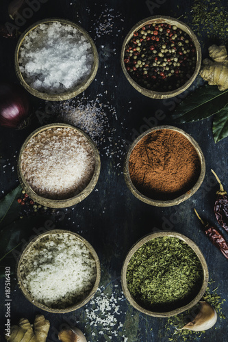 Set of spices on rustic blue background