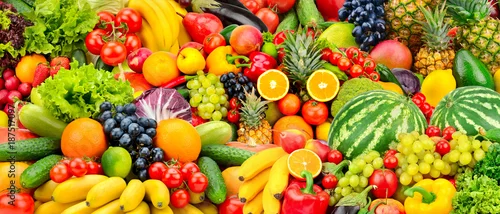 Obraz  z motywem Assorted fresh ripe fruits and vegetables. Food concept background.
